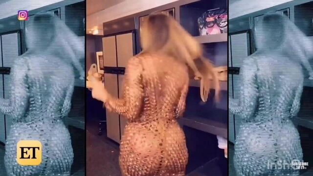 Cardi B plays in Golden fishnets