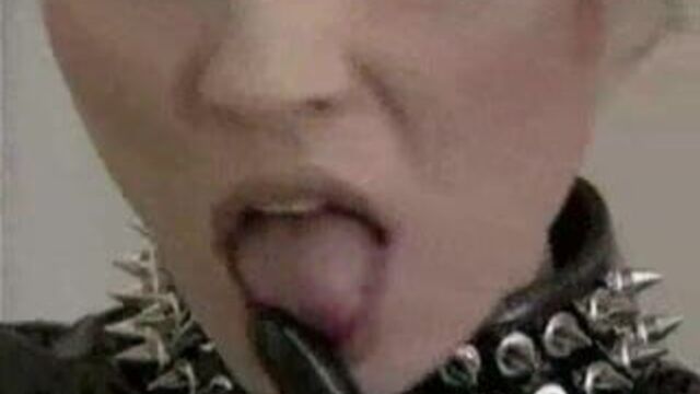 Latex Slave Dominates A Whore