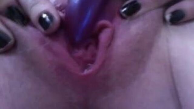 Purple vibrator right on the clit