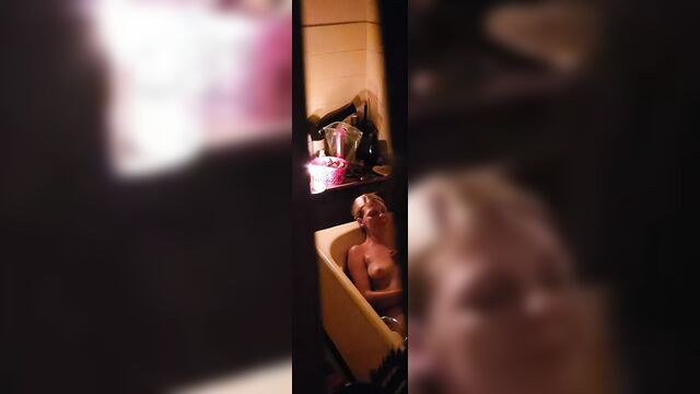 Voyear camera filming my hot stepmom while she takes a bath