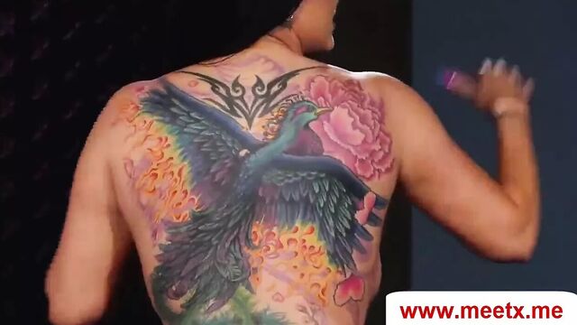 Naked News, Romi Rain