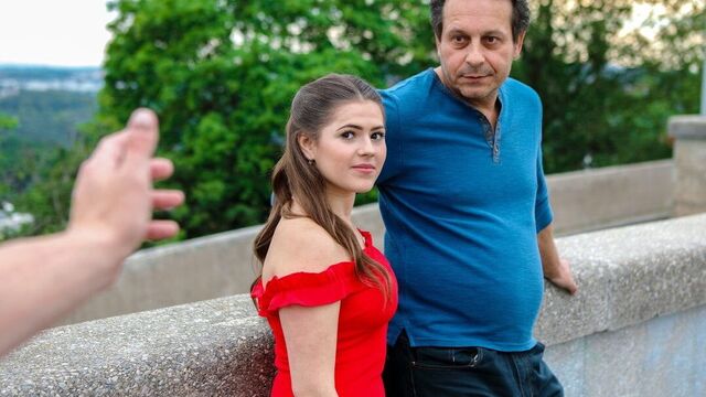 HUNT4K. Prague girl in beautiful red dress takes it off