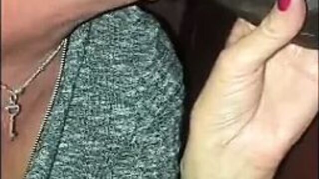 Wife sucks BBC at the gloryhole