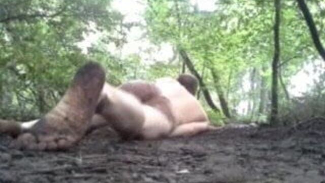 Jacking off in muddy woods